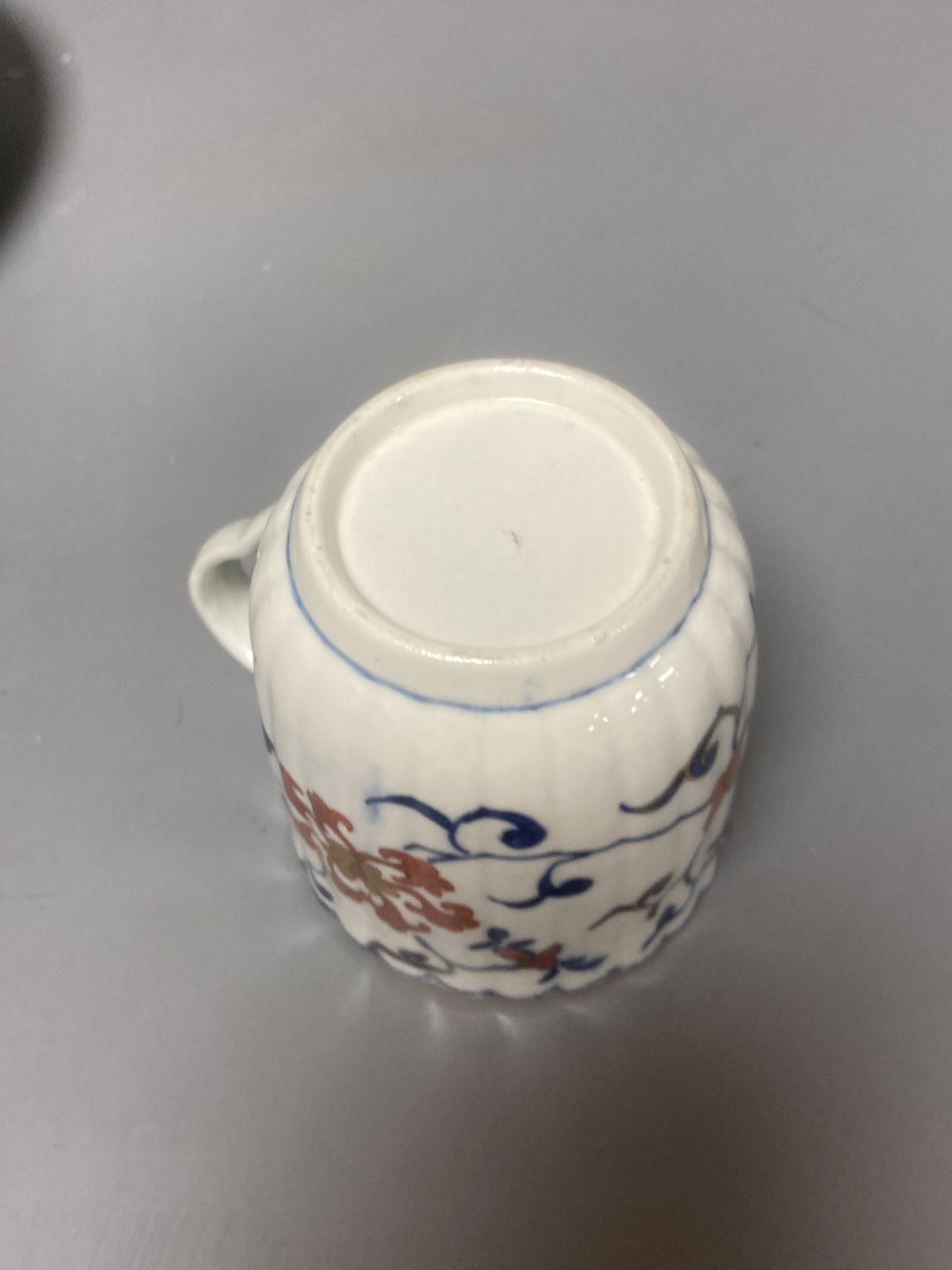 A group of Worcester blue and white ceramics, a Japan pattern cup and a Samson blue and white saucer, tallest 8cm